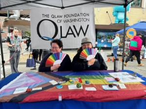 Pacifica Law Group attorney Rachelle Stefanski and QLaw Foundation Co-Executive Director Denise Diskin at the QLaw table at Everett Pride, 2023.