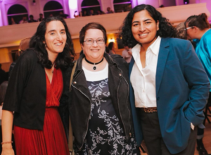 Pacifica attorneys Rachel Simon (left) and Shweta Jayawardhan (right) with Rachelle Stefanski at QLaw's 2023 Falltacular event.