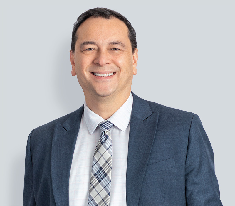 Portrait of Pacifica Law Group Partner Greg Wong.